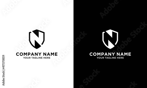 Abstract letter N shield logo design template. Premium nominal monogram business sign. Universal foundation vector icon.on a black and white background.