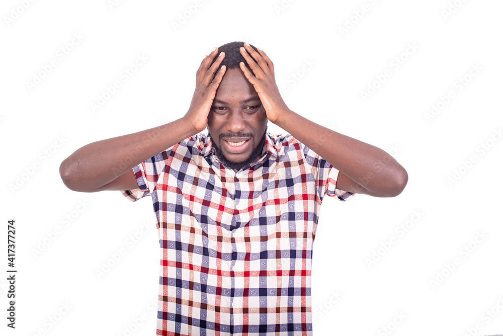 portrait of a young man feeling headache. portrait of a young man feeling headache.