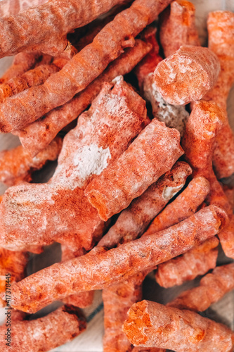 Many red corals on a white background. Top view. Copy  empty space for text