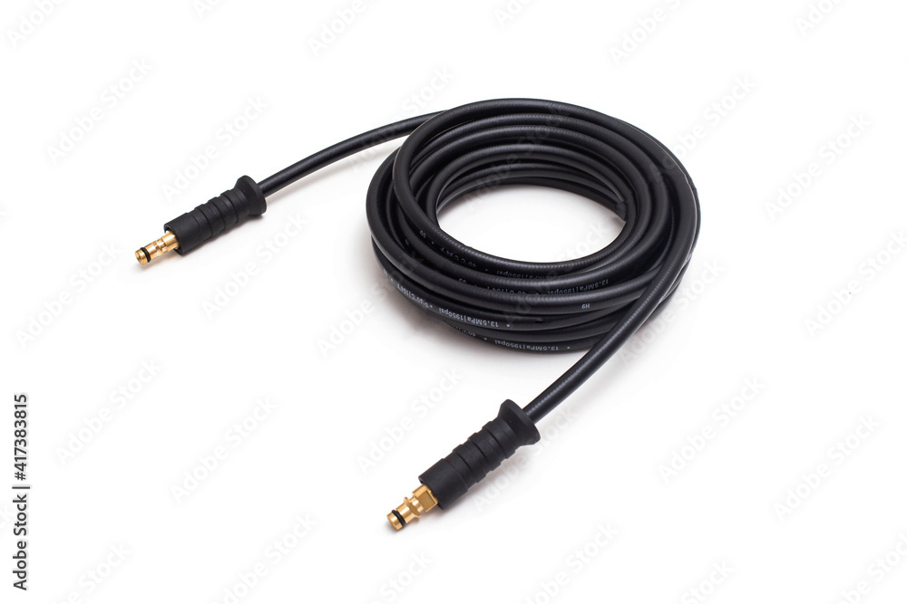 High pressure hose for pressure washer on white background, isolate. Close-up High pressure hose for pressure washer on white background, isolate. Close-up
