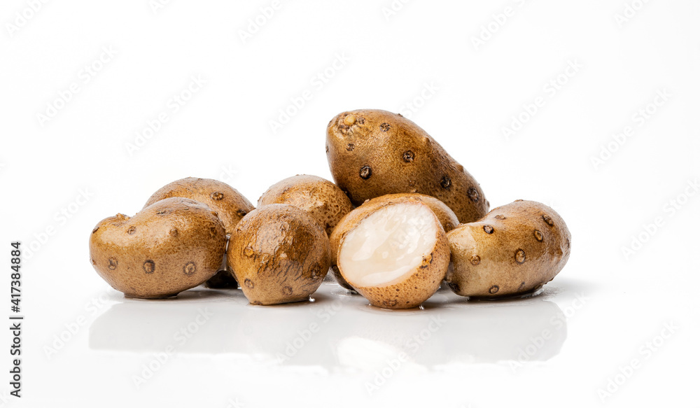 Multiple fresh yam beans on pure white background Multiple fresh yam beans on pure white background