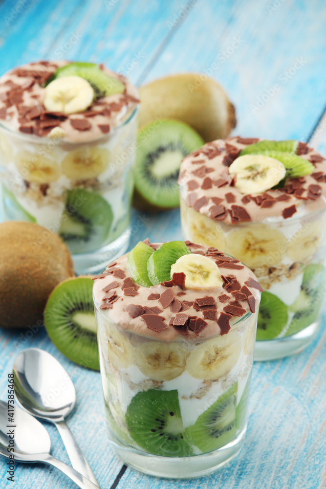 Trifle desserts with bananas, kiwi and yogurt Trifle desserts with bananas, kiwi and yogurt