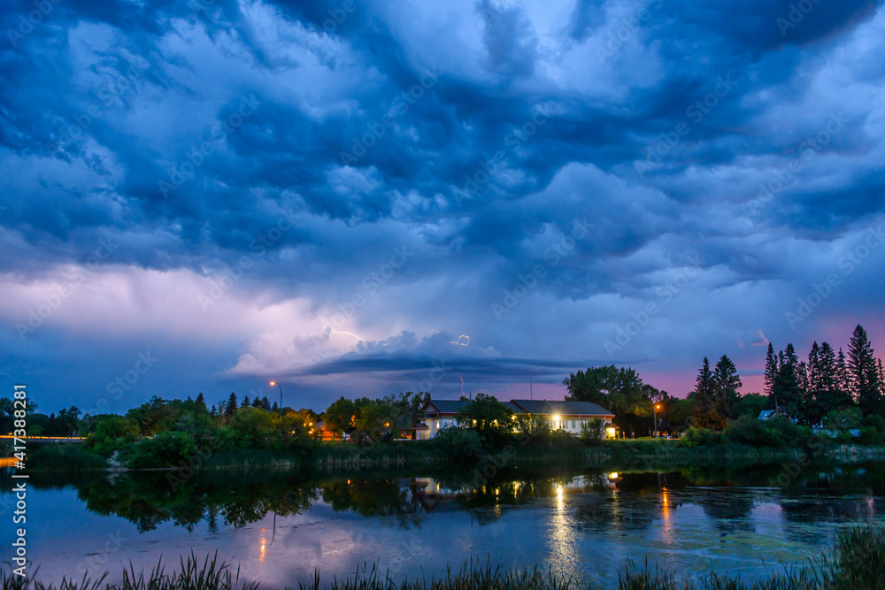 Dramatic sky over buildings and water, Ontario, Canada Dramatic sky over buildings and water, Ontario, Canada