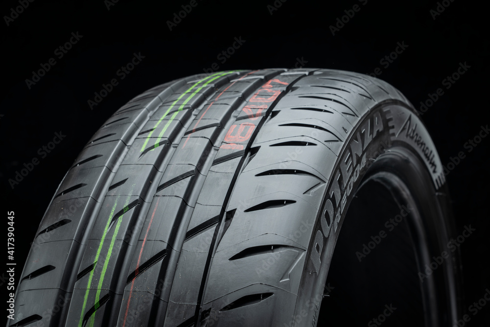summer tire tread, new model Bridgestone Potenza adrenalin re 004-new  safety sports tire Stock Photo | Adobe Stock