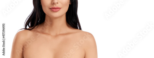 Cuadro en lienzo Close up of brunette with bare shoulders posing indoors