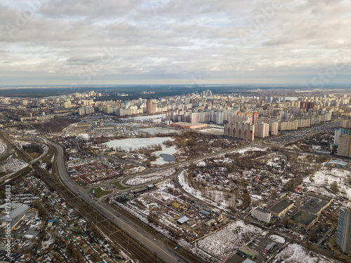 Railway in Kiev city. Aerial drone view. Cloudy winter day.