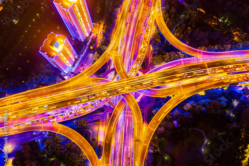 Canvas Print Aerial view of buildings and highway interchange at night in Shanghai,China