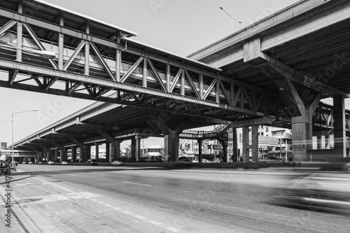 Wallpaper Mural black and white style of road in city with grand motorway construction and vehicel traffic Torontodigital.ca