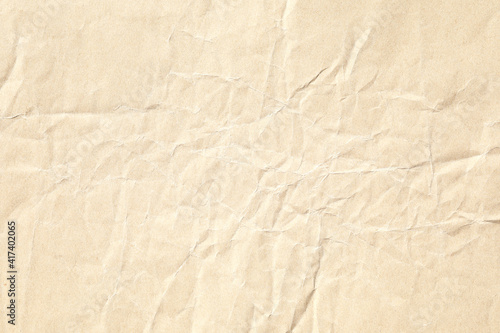 Crumpled brown background paper sheet texture