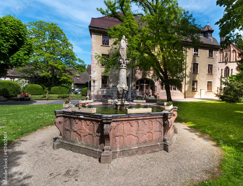 The inner courtyard of the Lichtental Abbey with St. Mary‘s fountain in Baden Baden. Baden Wuerttemberg, Germany, Europe photo