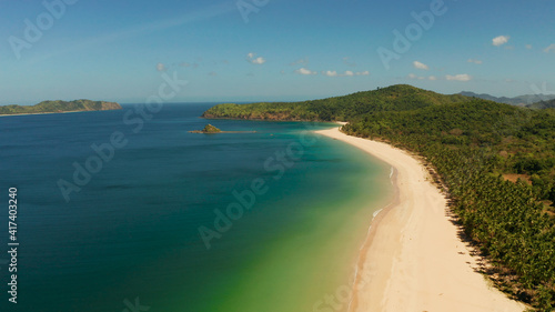 Tropical island with sandy beach, aerial view. Nacpan, El Nido, Palawan, Philippine Islands. Seascape with tropical beach and islands. Summer and travel vacation concept © Alex Traveler