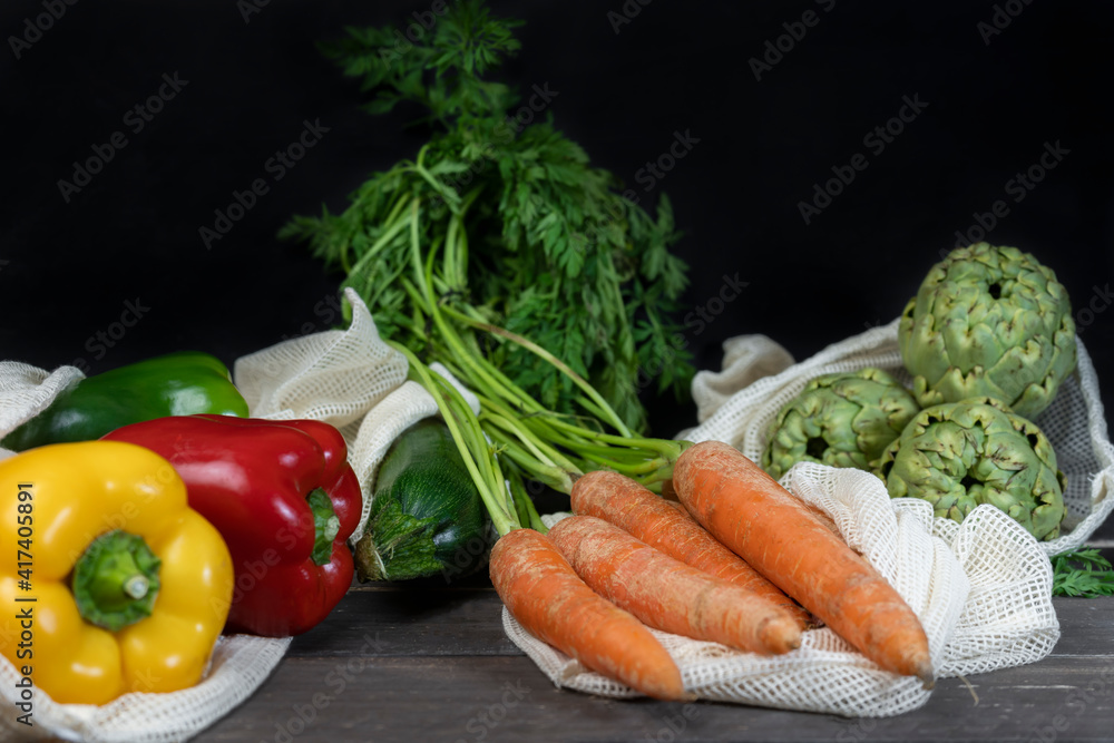 Fresh vegetables in eco reusable shopping bag .Zero waste ,plastic free concept .Groceries in eco friendly cotton bags,sustainable lifestyle . Fresh vegetables in eco reusable shopping bag .Zero waste ,plastic free concept .Groceries in eco friendly cotton bags,sustainable lifestyle .