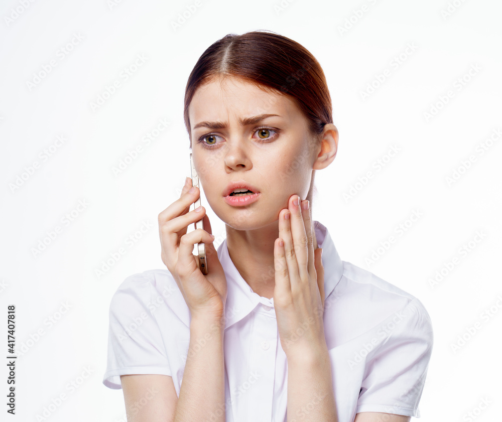 woman in shirt with phone in hands technology secretary woman in shirt with phone in hands technology secretary