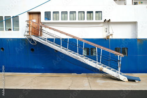 Canvas Print Gangway entrance on a ship docked in harbor.