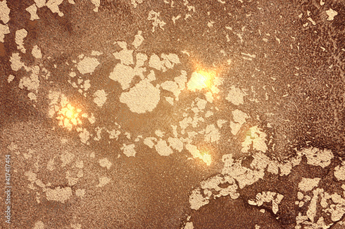 Gold and chocolate brown shining abstract marble background. Vector texture in alcohol ink technique with glitter. Template for banner, poster design. Fluid art painting