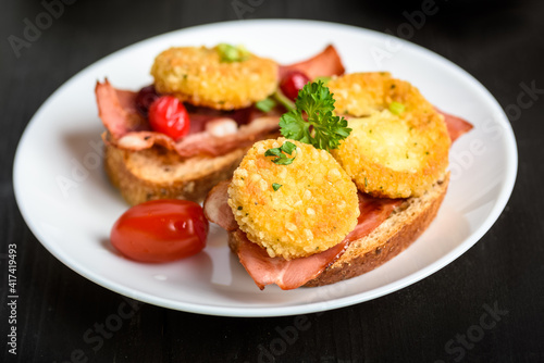 sandwich with fried camembert cheese and bacon