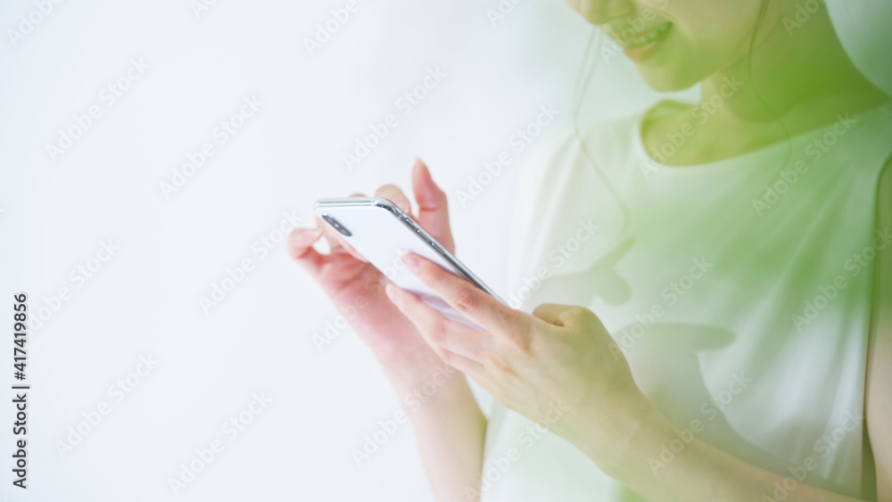 Naklejka premium スマートフォン・女性
