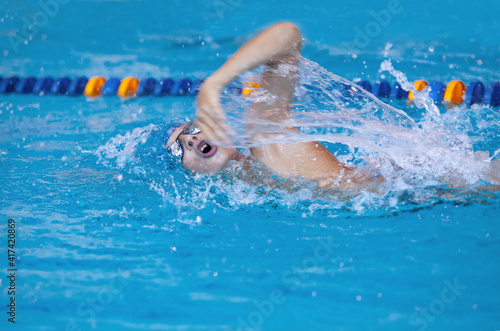 sporty swimming in pool © yanlev