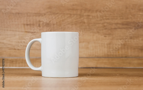 White mug on the wooden table