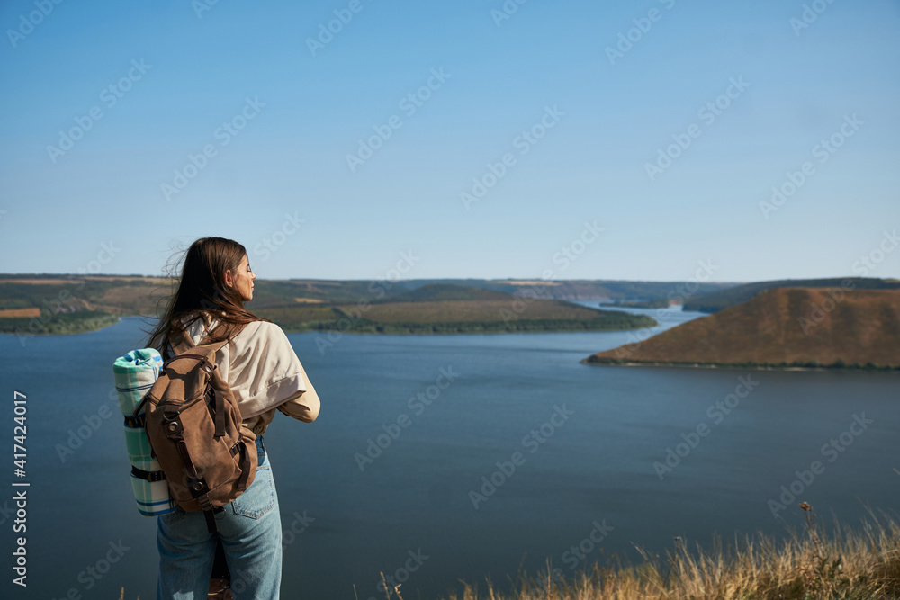 Woman admiring beautiful landscape of Dniester canyon