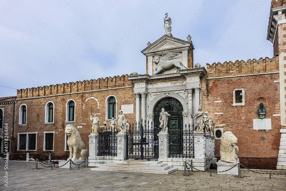 Fototapeta premium Fragments of the historic Venetian Arsenal (Arsenale di Venezia) complex. Construction of Arsenal began in 1104, during Venice republican era. Venice, Italy.