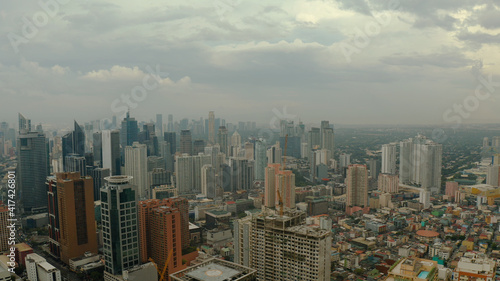Skyscrapers and business centers in a big city Manila top view. Modern metropolis in Asia  top view.
