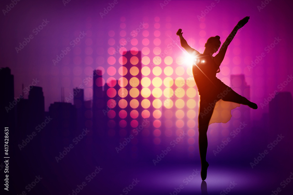 Ballet dancer dancing sparkling lights background