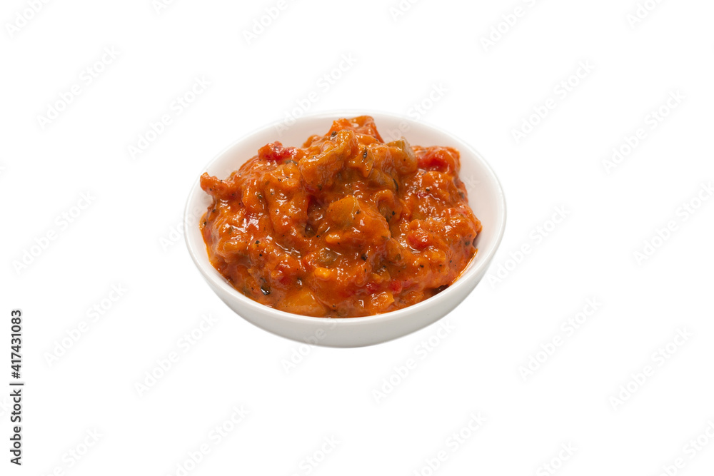 Vegetable stew in a bowl isolated on white background.