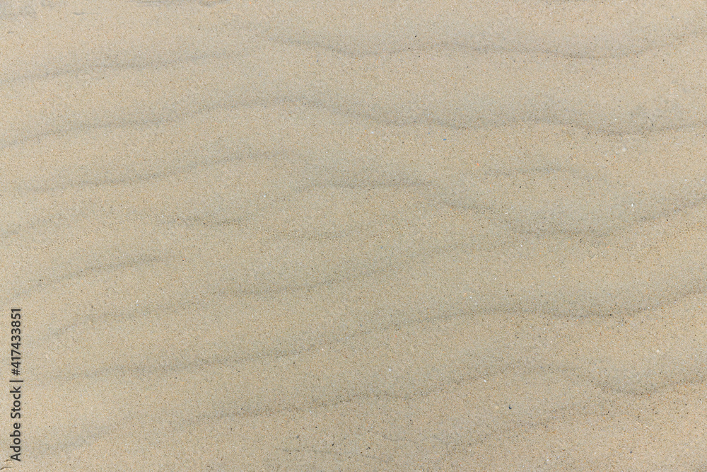 Natural sand stone texture background. sand on the beach as background. Wavy sand background for summer designs. Natural sand stone texture background. sand on the beach as background. Wavy sand background for summer designs.