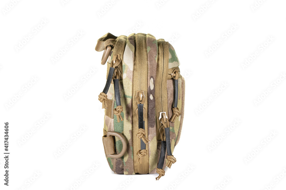 Green Canvas Backpack Isolated on White. Front View of Modern Waterproof Camping Traveler Back Pack Bag with Shoulder Straps and Haul Loop. Tactical Hiking Backpack For Travel Travel for Men Green Canvas Backpack Isolated on White. Front View of Modern Waterproof Camping Traveler Back Pack Bag with Shoulder Straps and Haul Loop. Tactical Hiking Backpack For Travel Travel for Men