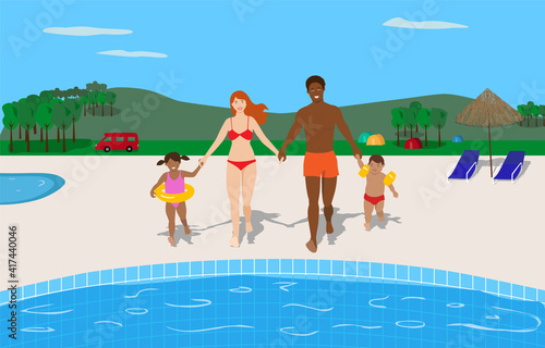 Happy young mixed race family enjoying the pool in a camping.