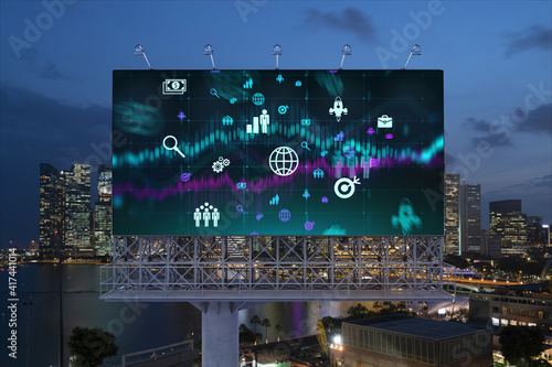 Research and technological development glowing icons on billboard. Night panoramic city view of Singapore. Concept of innovative activities expanding new services or products in Southeast Asia.