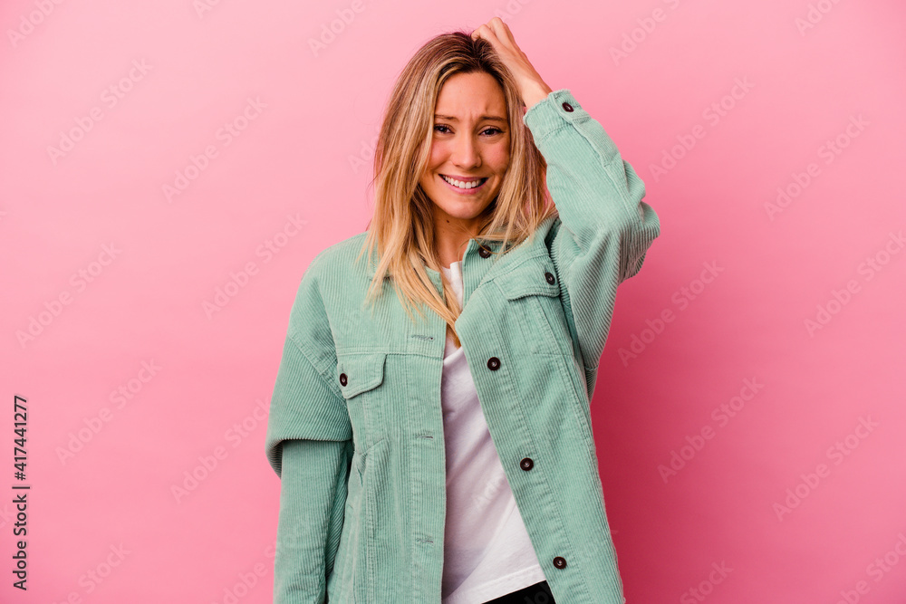 Young mixed race woman isolated on pink background forgetting something, slapping forehead with palm and closing eyes. Young mixed race woman isolated on pink background forgetting something, slapping forehead with palm and closing eyes.