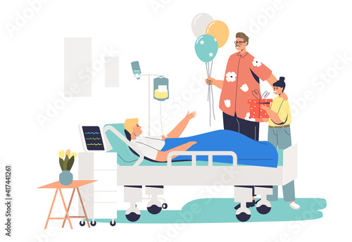 Family visiting patient in hospital during recovery. People with balloons at sick man bed