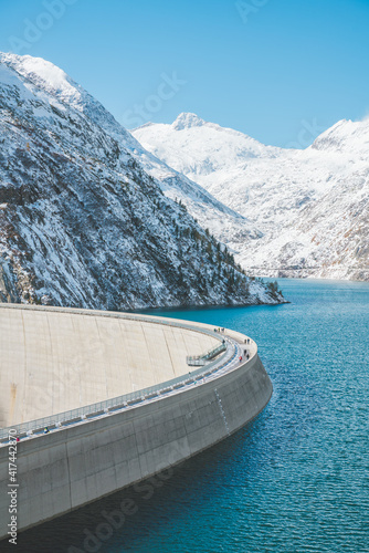 Aerial view of alpine dam and reservoir lake Kolnbreinsperre, Malta valley, Carinthia, Austria photo