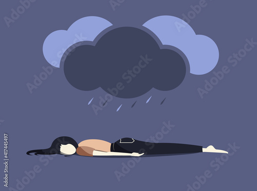 Depressive girl lying on the floor