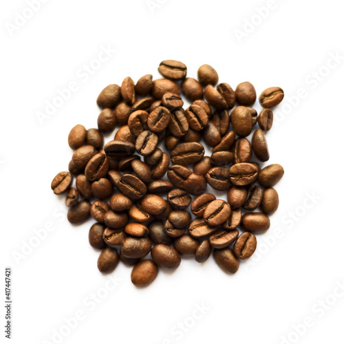 Flat lay of many coffee beans isolated on white background.