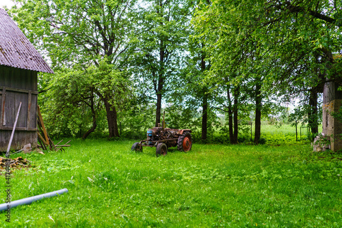 old broken tractor in the field