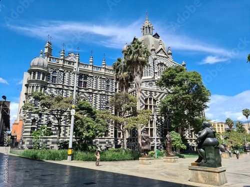 Medellin, Antioquia, Colombia. July 19, 2020:Palace of Culture and Sculptures Fernando Botero. Antioquia Museum in the background. photo