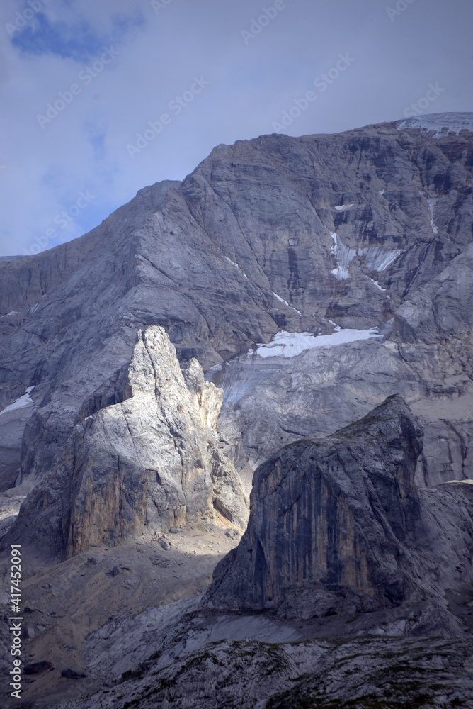The Marmolada glacier in summer: Aerial view of the last and the only glacier of the Dolomites, UNESCO heritage, near the town of Canazei - August 2018 - Evidence of global warming and melting glacier