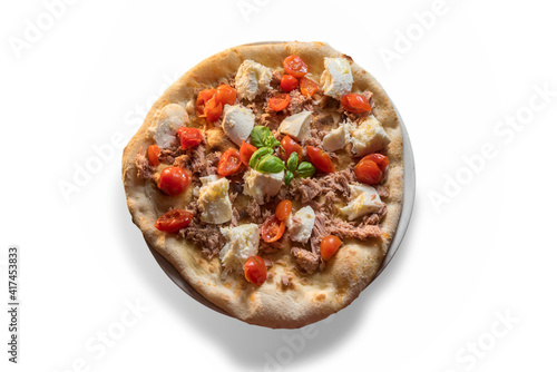 pizza with tuna fillet, mozzarella and cherry tomatoes and basil leaves. Top view isolated on white