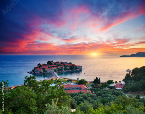 Fototapeta Naklejka Na Ścianę i Meble -  Dramatic view of the small islet Sveti Stefan. Location place Montenegro, Adriatic sea, Europe.
