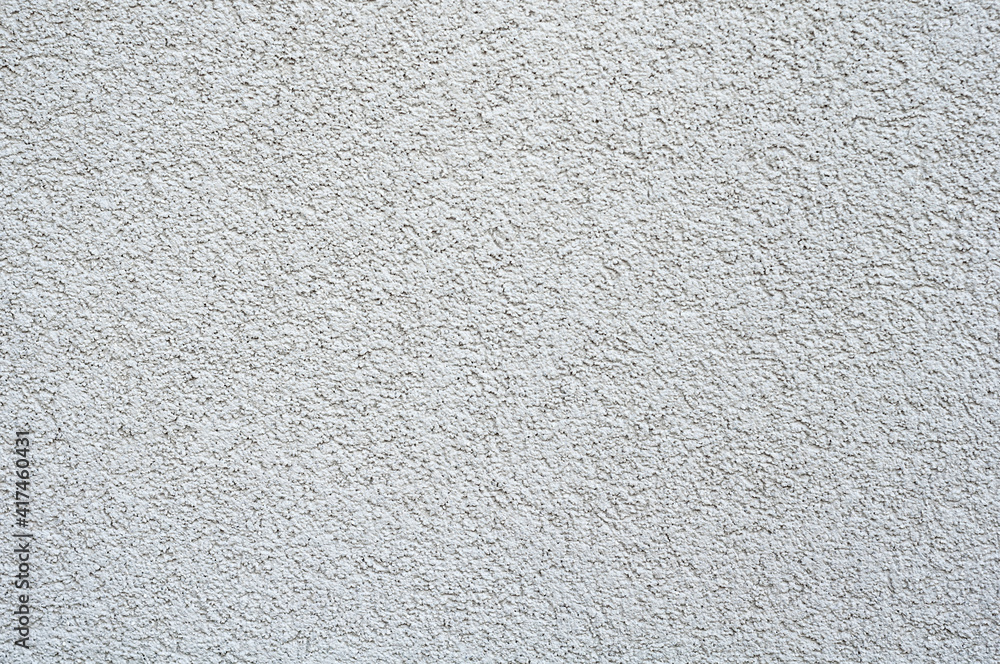 White wall texture, concrete plaster, fine grungy background. White wall texture, concrete plaster, fine grungy background.