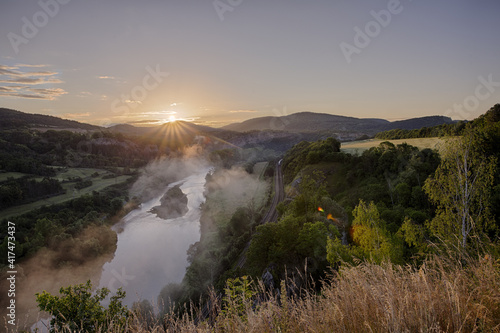 Sunrise over the river Berounka. Photographed from the viewpoint on the ruins of Tet  n Castle.