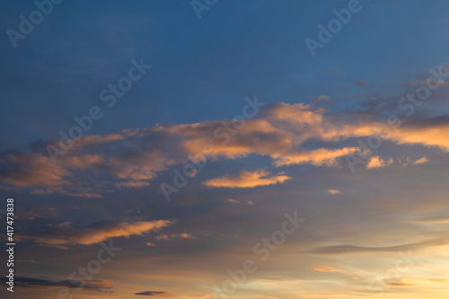 Beautiful sunset sky with amazing colorful clouds © Oksana