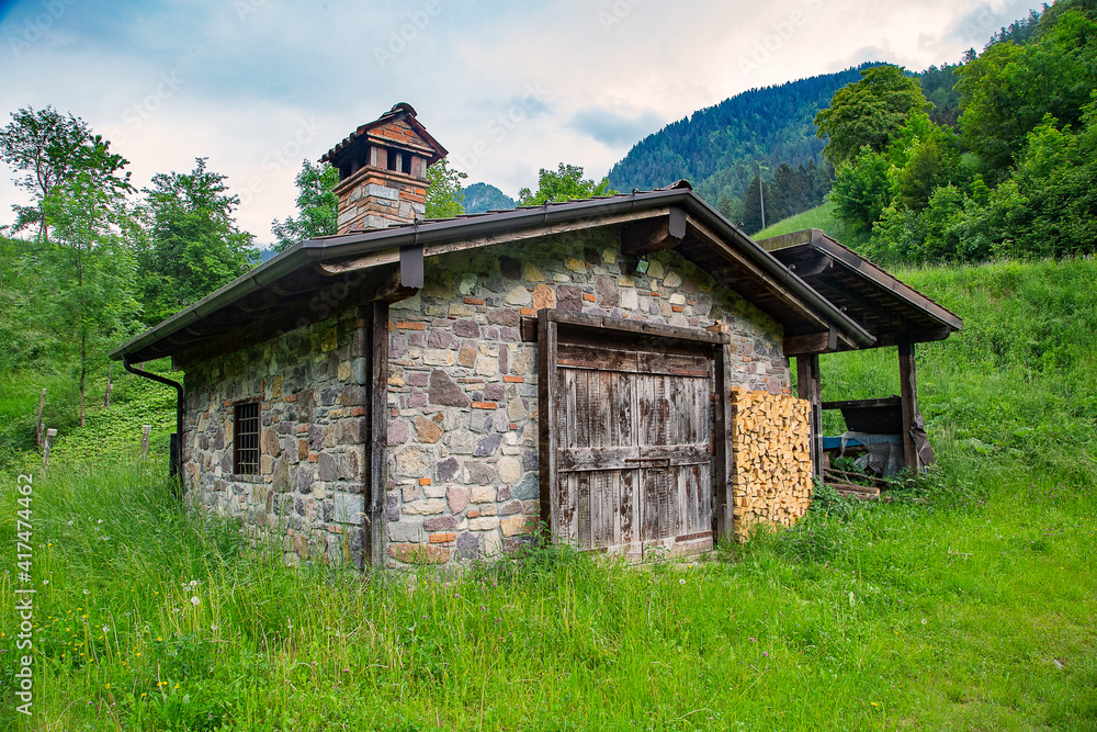Old stone house in the mountains of Val Sabbia, province of Brescia, in upper Val Trompia, in Lombardy, Italy.