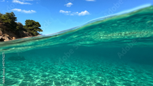 Underwater sandy sea bed in tropical exotic turquoise bay