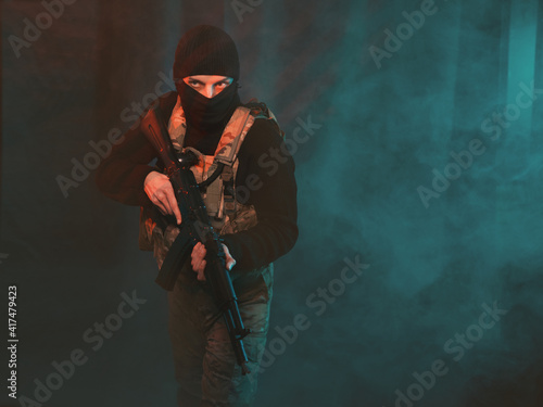 Special forces soldier on a background of smoke
