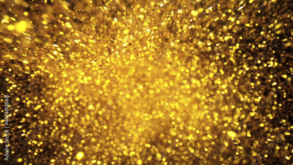 Abstract golden glitters on black background