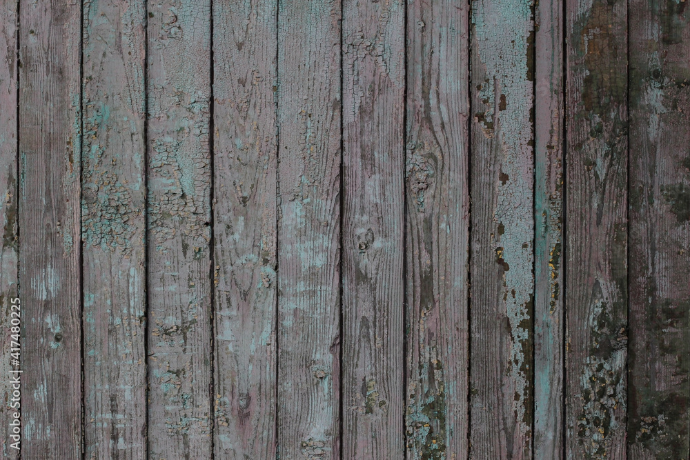 Naklejka premium cracked old paint on wooden boards texture background planks backdrop